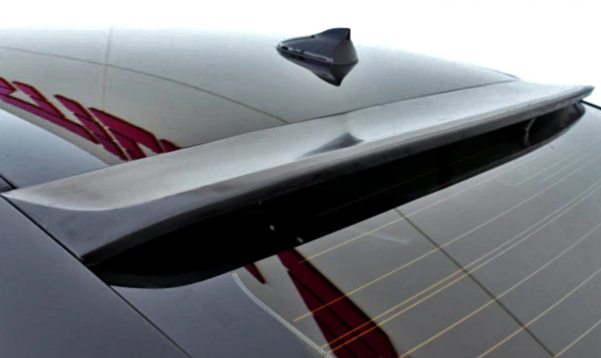 A back close up view of the roof wing of the Stillen Roof Wing for Infiniti Q50 2014-2017 fitted on a black car