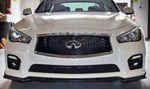 A front wide view of a white car fitted with Stillen Front Splitter for Infiniti Q50 Sport 2014-2017 on the ground