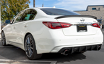 A back wide view of a white car fitted with Stillen Rear Diffuser [UNPAINTED] for Infiniti Q50 2018-2024 on the ground