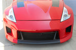 A front close up view of a red car fitted with Stillen Front Fascia for Nissan 370Z [Z34] 2009-2020 on the ground