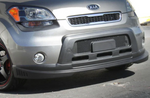 A front close up view of a car fitted with Stillen Front Lip Spoiler for Kia Soul 2010-2011 on the ground