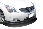 A front close up view of a white car fitted with Stillen Front Lip Spoiler for Nissan Altima Sedan 2010-2012 on a white background.