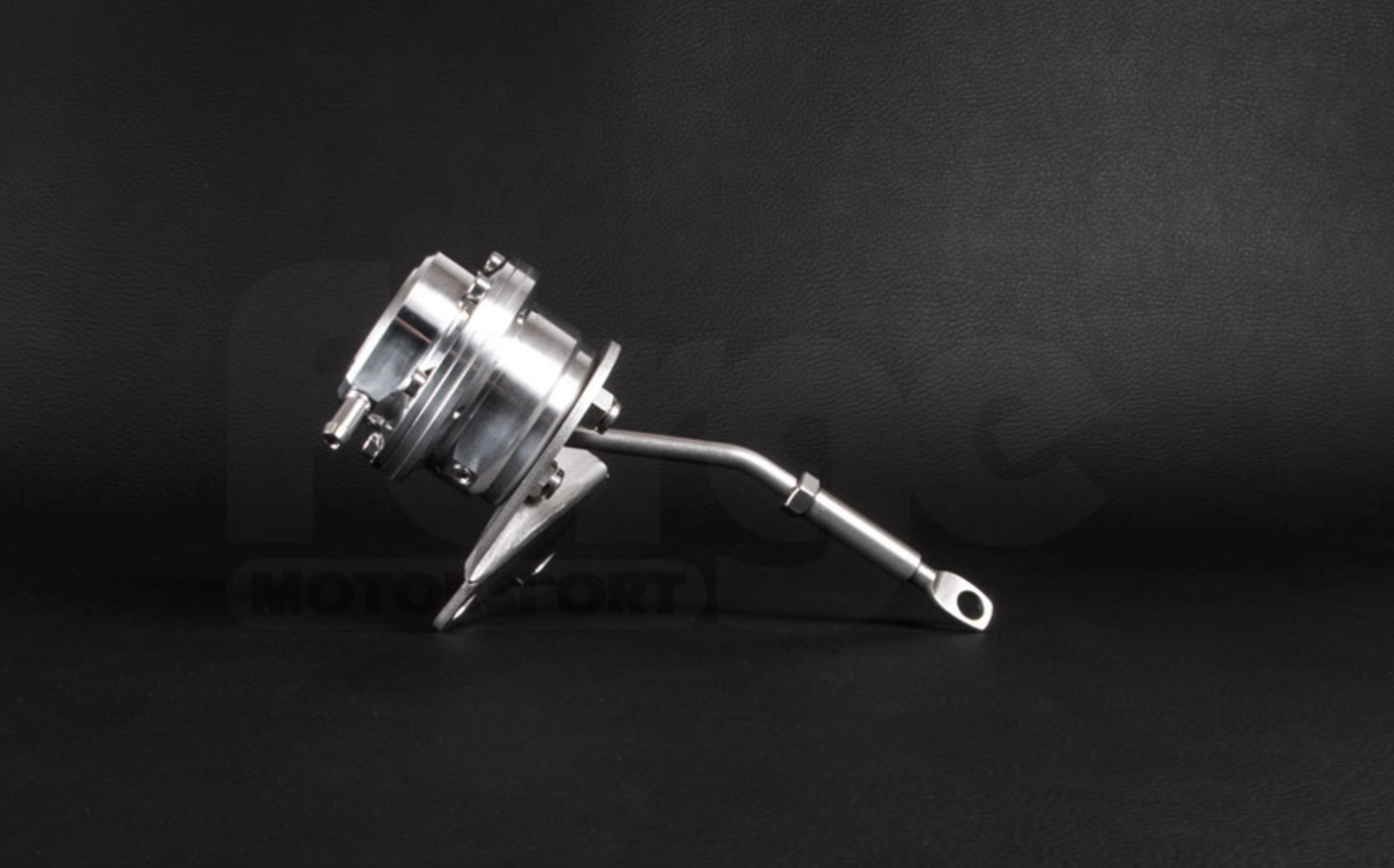 A side wide view of Forge Motorsport Adjustable Diaphragm Actuator for Subaru TD04/TD05 Turbochargers from the left with a black background