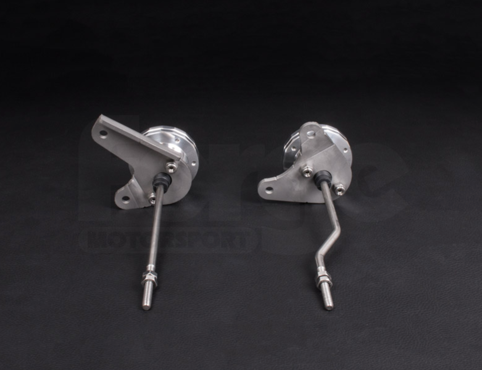 A back wide view of Forge Motorsport Twin Turbo Actuators for Porsche 996 Turbo / GT2 2000-2005 with black background