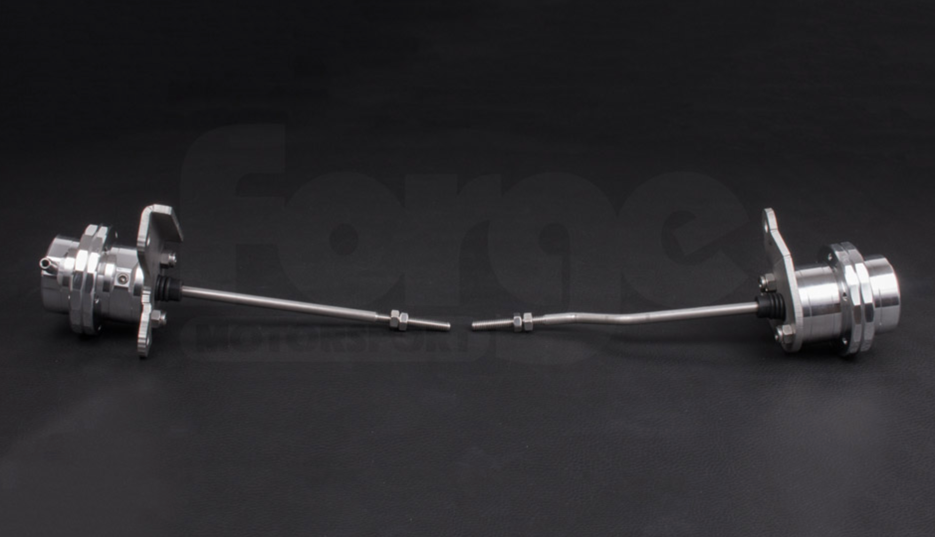 A side wide view of Forge Motorsport Twin Turbo Actuators for Porsche 996 Turbo / GT2 2000-2005 with black white background