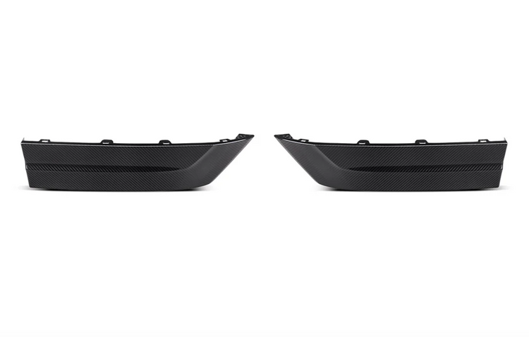 A front view of AutoTecknic Carbon Fiber Rear Splitter Set - BMW F96 X6M LCI / Pre-LCI 2020-2025 with white background