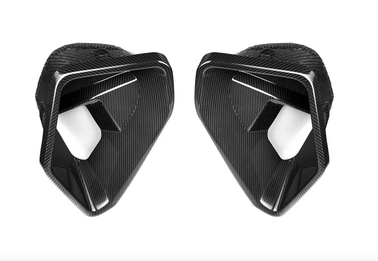 A top wide view of AutoTecknic Carbon Fiber Front Bumper Air Vent Set - BMW G06 X6 M-Sport LCI 2023-2025 with white background