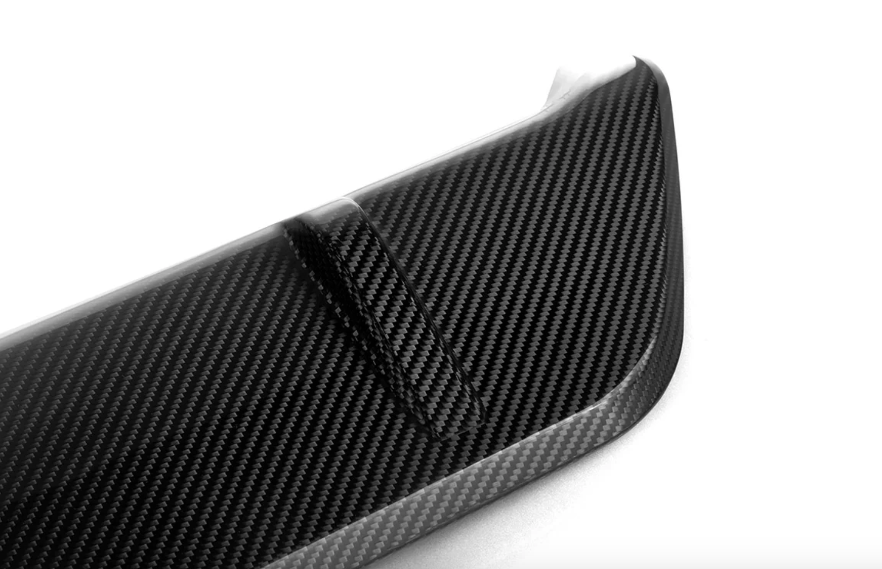 A close up view of AutoTecknic Carbon Fiber Performante Rear Diffuser - BMW G06 X6 M-Sport 2019-2025 with white background