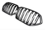A side wide view of AutoTecknic Dual-Slat Carbon Fiber Front Grille - BMW G06 X6 LCI 2023-2025 with white background