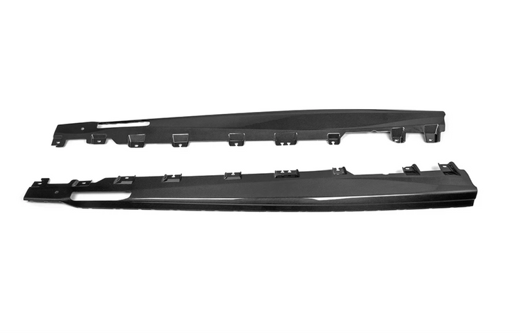 A top wide view of AutoTecknic Carbon Fiber Side Skirt Extension Set - BMW F96 X6M / G06 X6 2019-2025 with white background