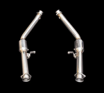 A pair of polished T304 stainless steel catted downpipes for the Mercedes-Benz G63 (W463) featuring integrated high-flow catalytic converters and precision-welded mounting brackets on a black background.