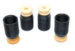 A set of four automotive suspension components consisting of black accordion-style rubber dust boots and cream-colored foam bump stops. Two units are assembled with the bump stops on top, while the other two show the hollow interior of the ribbed boots, all designed for the Toyota GR Supra.