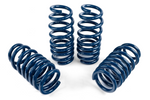 A set of four blue powder-coated automotive suspension coil springs, consisting of two larger, wide-diameter springs and two smaller, tapered springs.
