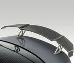 A back view of Vorsteiner VRS BMW G87 M2 Aero Wing Blade w/ Aluminum Uprights Carbon Fiber PP 2x2 Glossy fitted on a car