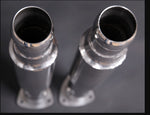 close view of Capristo Dampened Secondary Cat Delete Pipes for Aston Martin V12 Vantage 2022+ with black background