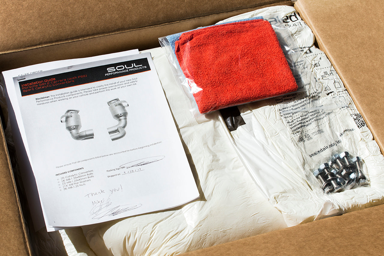 Soul 991.2 Carrera PSE sport cats / cat bypass pipes: cats packed with instructions