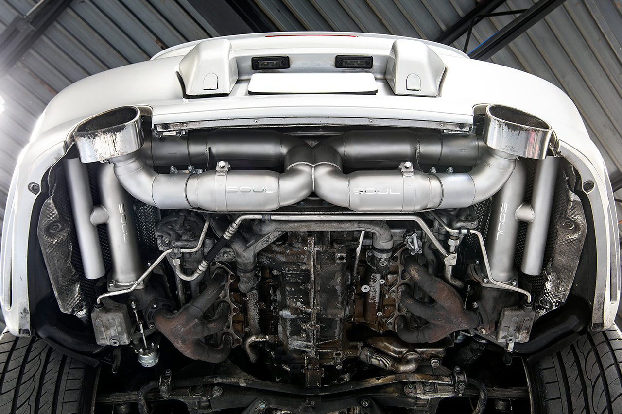 Soul 996 Turbo competition x-pipe exhaust system: exhaust installed under a white 996 Turbo