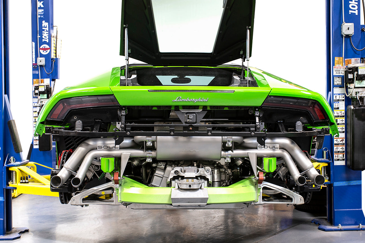 Huracan LP610 / LP580 valved exhaust system: valved exhaust installed on a green Huracan on a lift