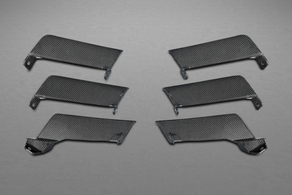 close view of Capristo Carbon Air Outlet Ribs (Matte) for Ferrari 458 Speciale 2013-2015 with grey background
