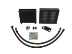 A front view of Evolution Racewerks Sports Series Oil Cooler Upgrade Kit for BMW N54/N55 135i/335i in Type III Hard Anodized Black