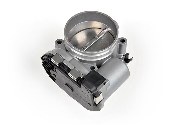 Genuine Porsche electronic throttle body, angled view of the bore and connector housing, optional add-on - IPD for Porsche 997.1 Turbo