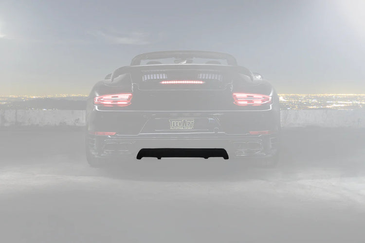 A back wide view of TECHART Diffusor Add-On for Rear Apron for Porsche 991.2 Turbo from MY17 in black Porsche with the Diffusor highlighted