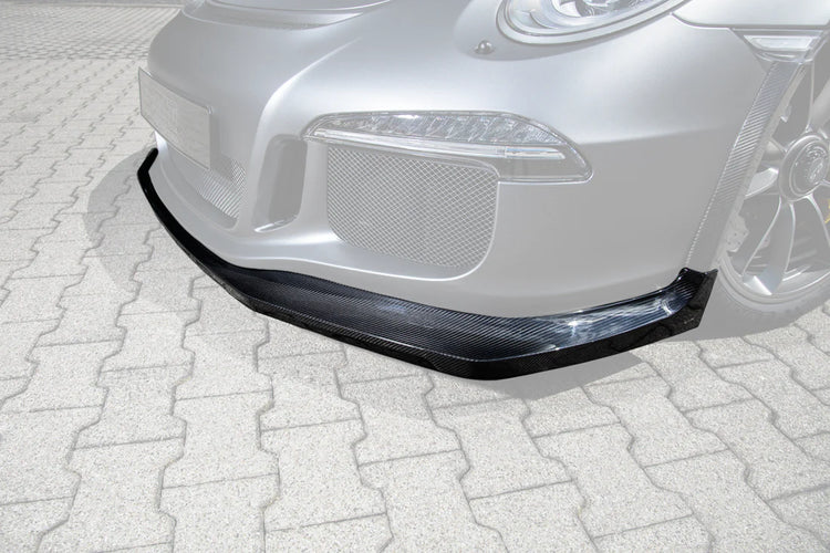 A close up view of TECHART Front Spoiler Carbon "glossy" for Porsche 991.1 GT3 RS until MY16 with the spoiler highlighted