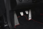 A close up view of TECHART Pedal-Kit, Aluminum, Manual Transmission for Porsche 987/981/718 / 997/991 fitted in a car with the pedals highlighted