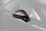 A close up view of TECHART Side Mirror Kit (L/R) Carbon "glossy" Sport Design for Porsche 991 / 981 with the side mirror highlighted