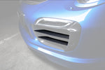 A close up view of TECHART Carbon Grille Trim Bar, "matte" for Porsche 991.1 Turbo S up to MY16 fitted on a blue Porsche with the Grille highlighted