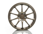 A direct front-facing view of a Titan 7 T-R10 forged wheel in Techna Bronze, highlighting the symmetrical 10-spoke pattern and center hub.