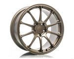 A three-quarter profile view of a Titan 7 T-R10 forged wheel in Techna Bronze, showing the depth of the 10-spoke design and the inner barrel.