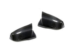 A front view of AUTOTECKNIC REPLACEMENT VERSION II AERO DRY CARBON MIRROR COVERS - TOYOTA A90 SUPRA 2020+ with white background