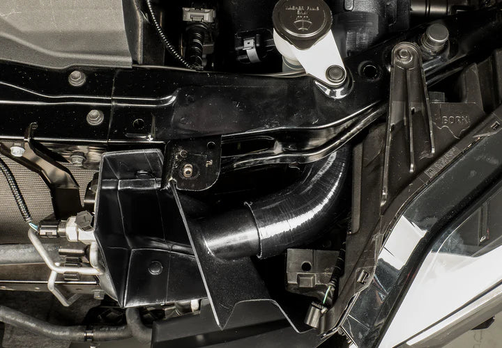 Close view of Stillen Trupower Cold Air Intake Dry Filter Toyota Tundra 2022-2025  fitted inside a car
