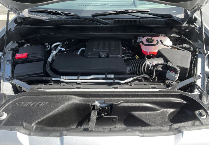Wide view of Stillen TruPower Cold Air Intake Scoop GMC Sierra 1500 2019-2023 fitted inside a car