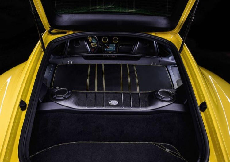 A close up view of TECHART Carbon Interior Kit VI Carbon Fiber, Graphite Gray Porsche 718 Cayman