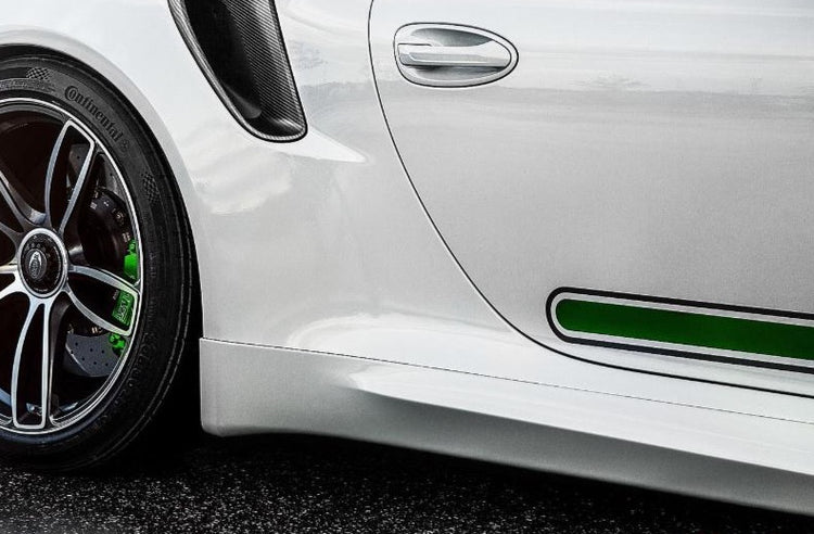 A close up side view of TECHART Side Skirts Porsche 991 GT3 / Turbo fitted on a white car