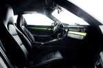 A close up view of TECHART Interior Styling Package I Glossy Carbon Fiber Porsche 991/991.2 Carrera / Targa / Turbo / GT3
