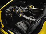 A close up view of TECHART Carbon Interior Kit I Carbon Fiber, Graphite Gray Left Hand Drive Porsche 718 Cayman / Boxster