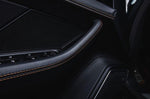 A close up view of TECHART Carbon Interior Kit II Carbon Fiber, Graphite Gray Porsche 718 Cayman / Boxster