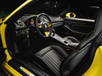 A close up view of TECHART Carbon Interior Kit IV Carbon Fiber, Graphite Gray Porsche 718 Cayman / Boxster