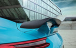 A side close up view of TECHART Type 2 Rear Wing Carbon Add On Blade Porsche 991 Carrera / Targa / Turbo fitted on a blue car