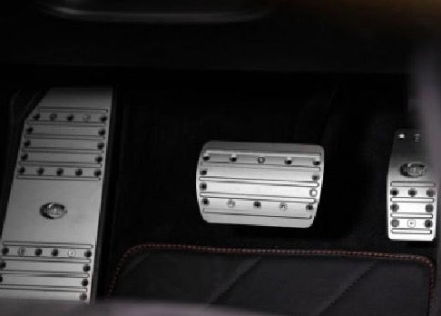 A close up view of TECHART Aluminum Foot Rest Porsche Cayenne