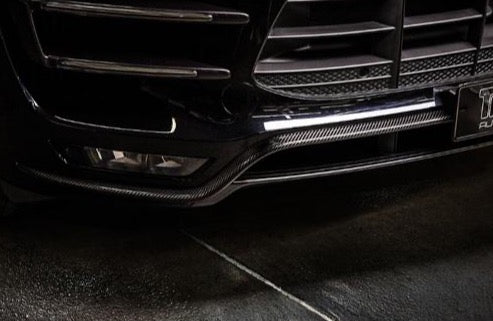A close up view of TECHART Front Shaft Panels Glossy Carbon Fiber Porsche 95B Macan Turbo | Turbo w/ Perf Pkg up to MY 2018