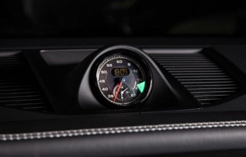 A close up view of TECHART Dashboard Panel for Sport Chrono Clock in Leather Porsche 95B Macan