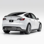 A side wide view of Vorsteiner VRS Aero Decklid Spoiler Carbon Fiber PP 2x2 Glossy fitted on a white car from behind (for Model Y).
