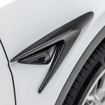 A side close up view of Vorsteiner VRS Add-On Aero Fender Vents Carbon Fiber PP 2x2 Glossy on a white car (for Model Y). 