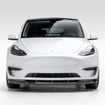 White Model Y with full aero program, head-on view