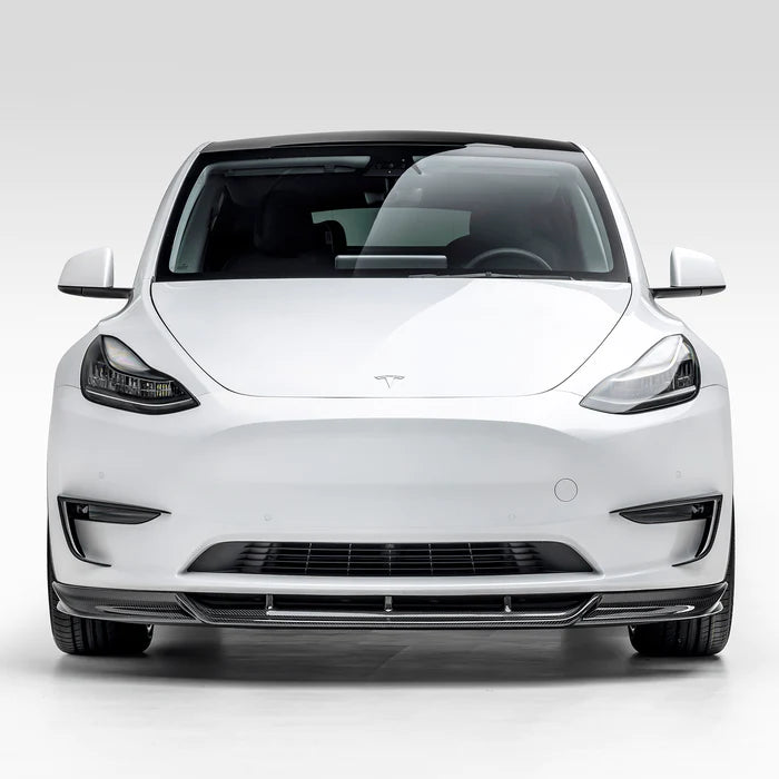 A look of Vorsteiner VRS Aero Front Spoiler Carbon Fiber PP 2x2 Glossy on a white car from the front (for Model Y).