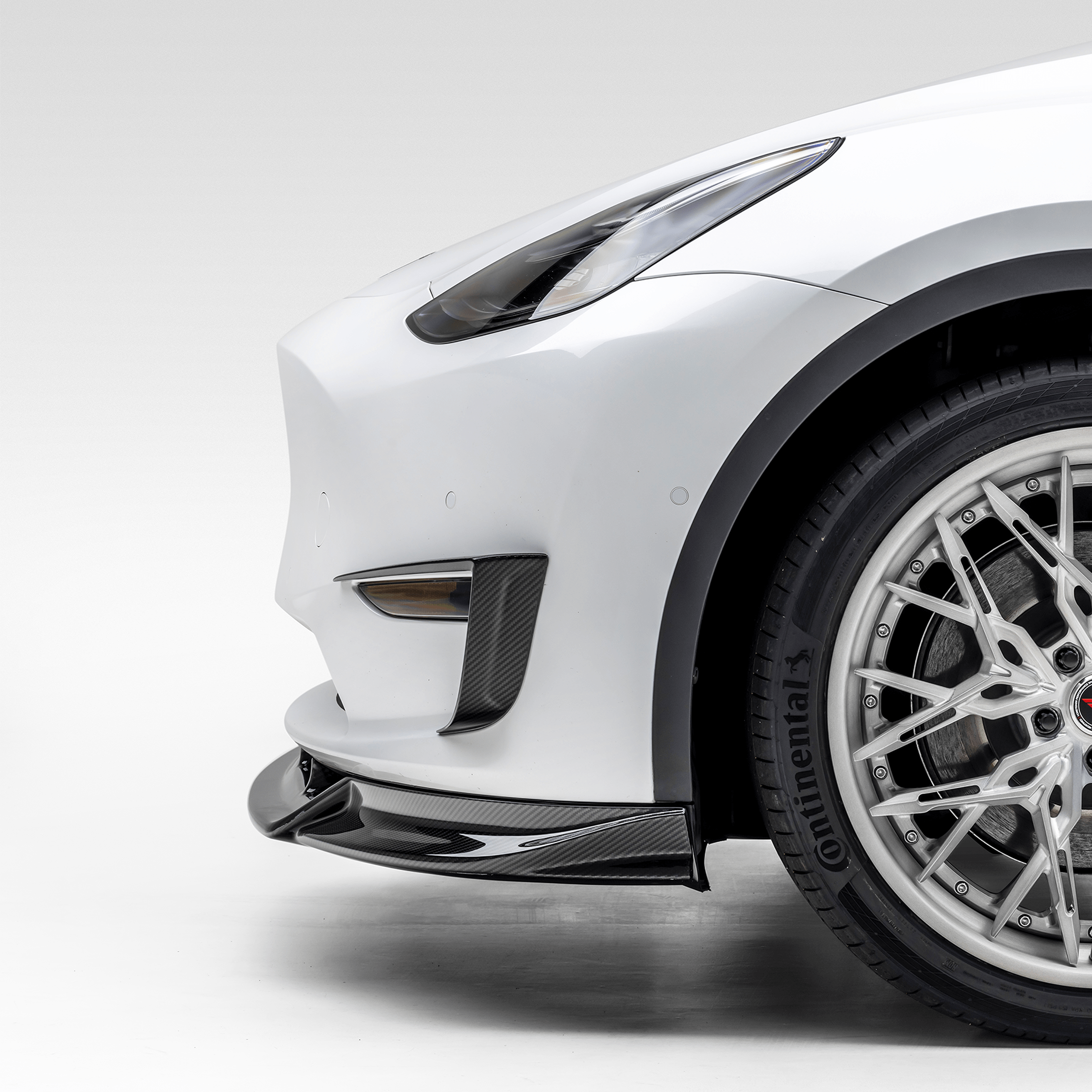 Model Y front spoiler and bumper flare, side detail